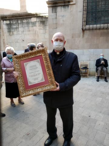 Mn. J.Antoni Gaya amb el guardó