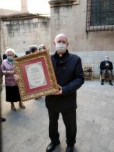 Mn. J.Antoni Gaya amb el guardó